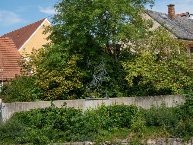 Moriskentänzer auf Hochwassermauer